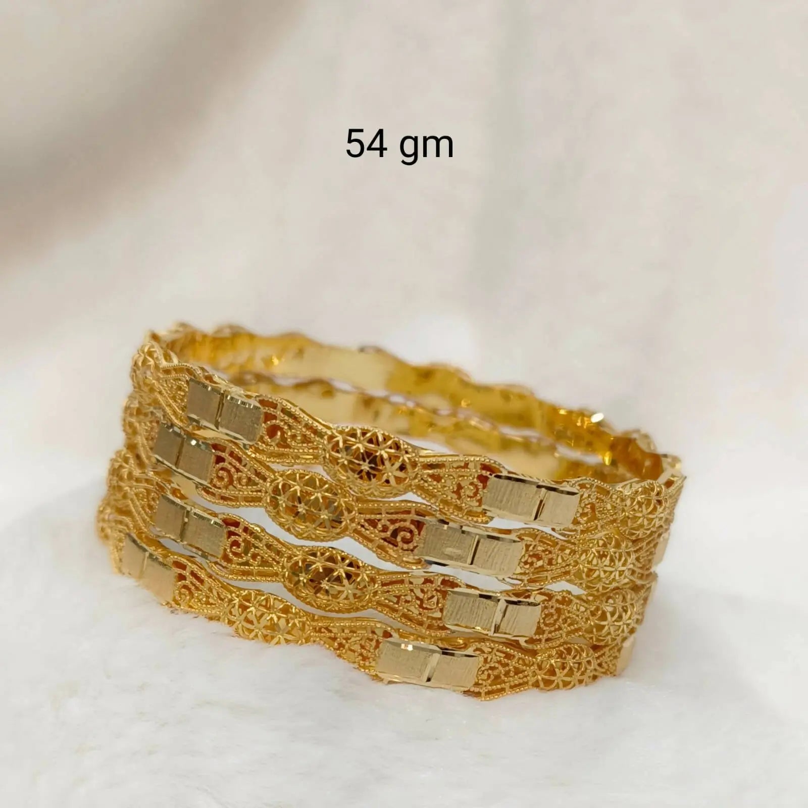 Display of dozens of golden bracelets in Turkish style - SuperStock