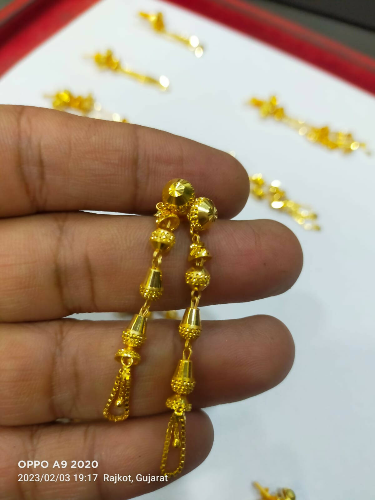 Earrings (rajkot bali) | Gold bangles design, Black beads mangalsutra  design, Gold earrings designs