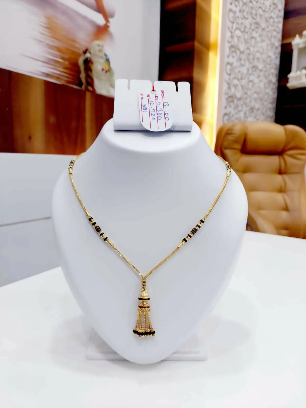 Short mangalsutra designs sales gold latest 2019