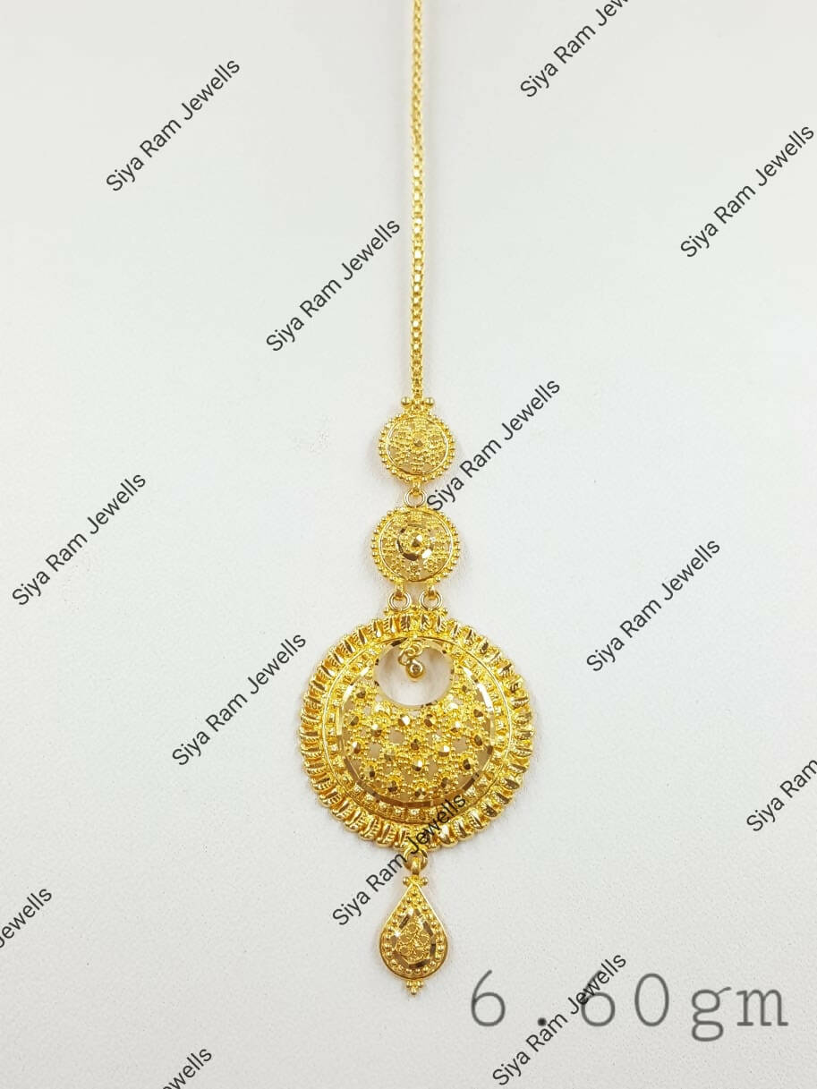 Gold maang tikka hot sale design image